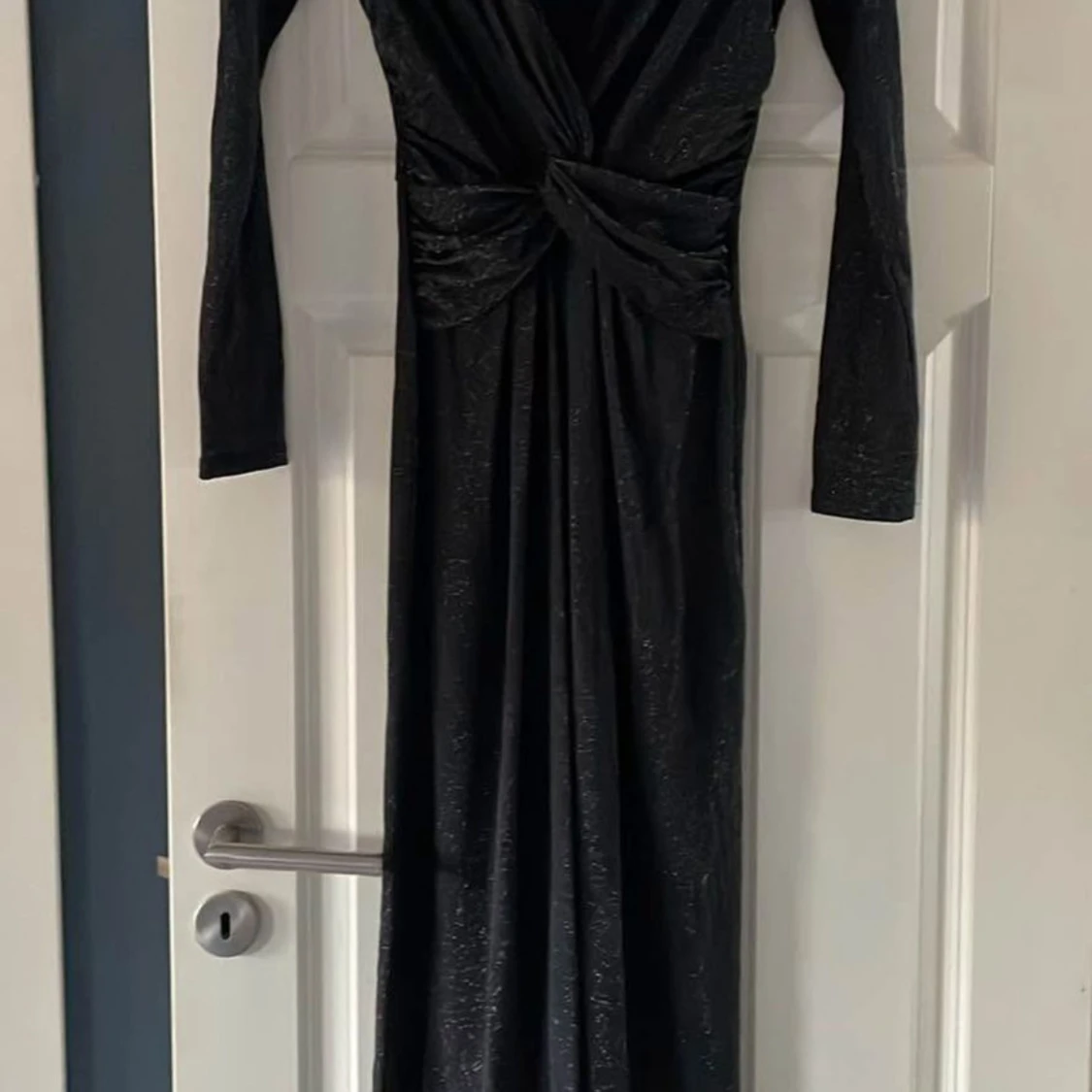 Svart glittrig jumpsuit