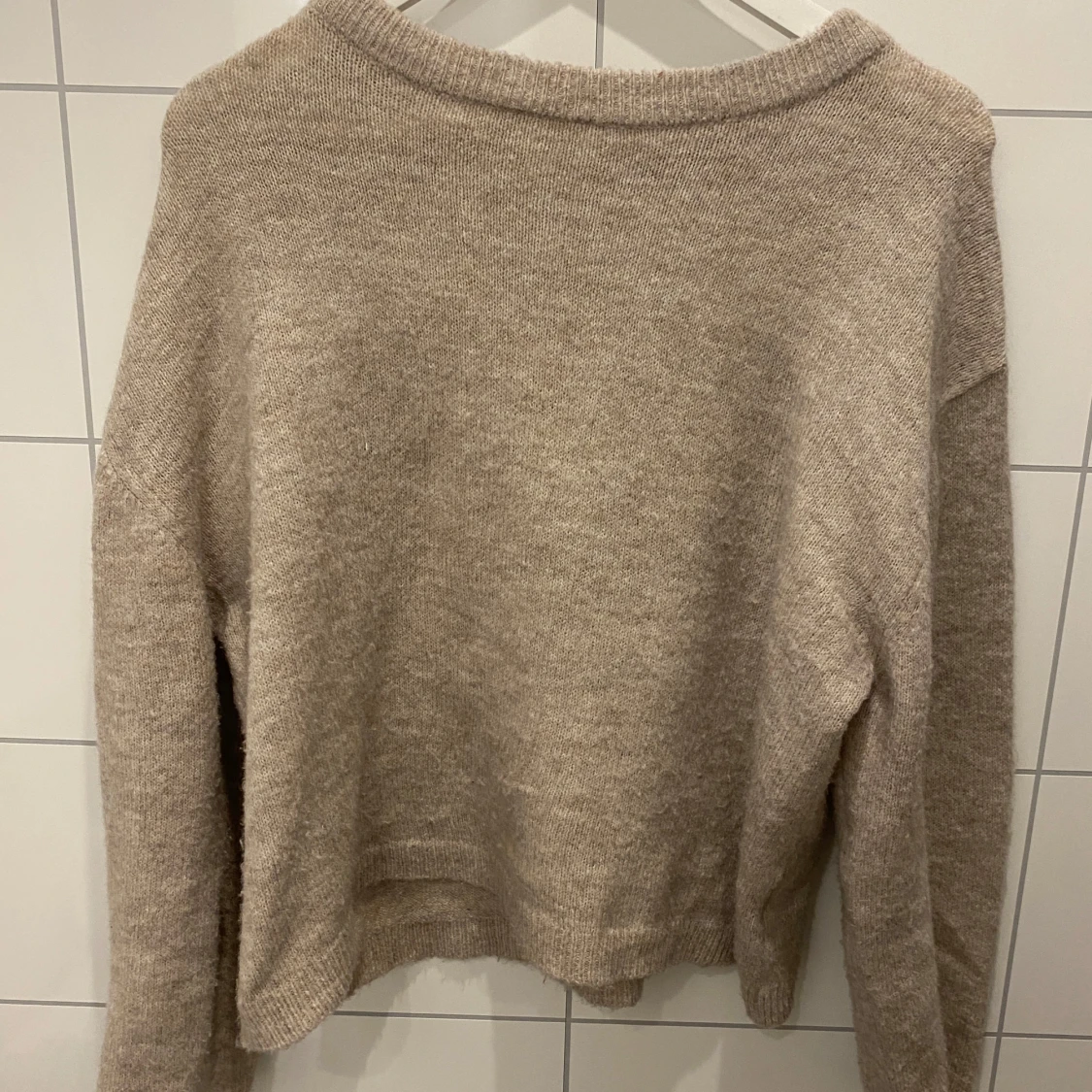 Beige stickad tröja från 157