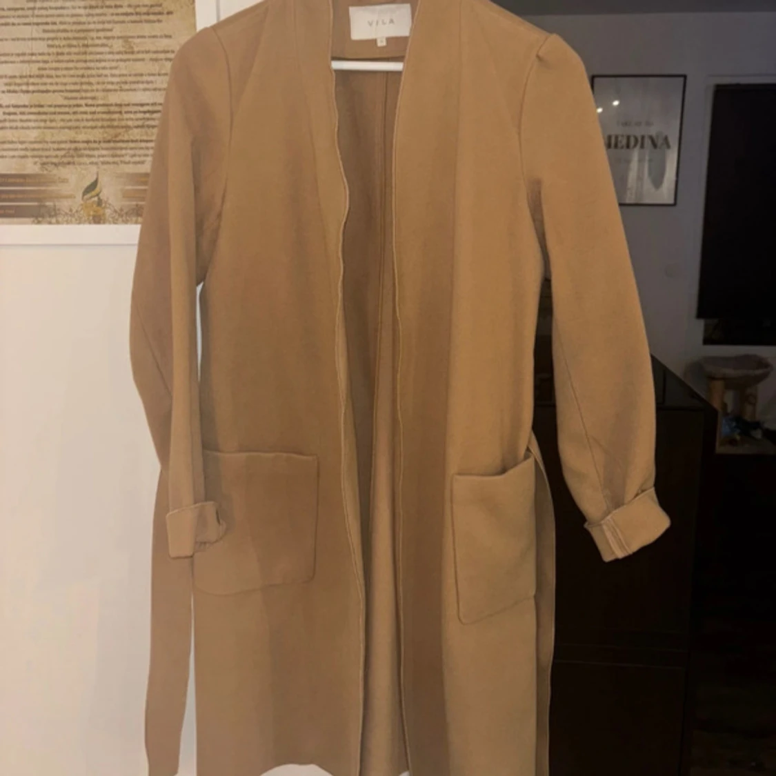 Beige kappa från VILA