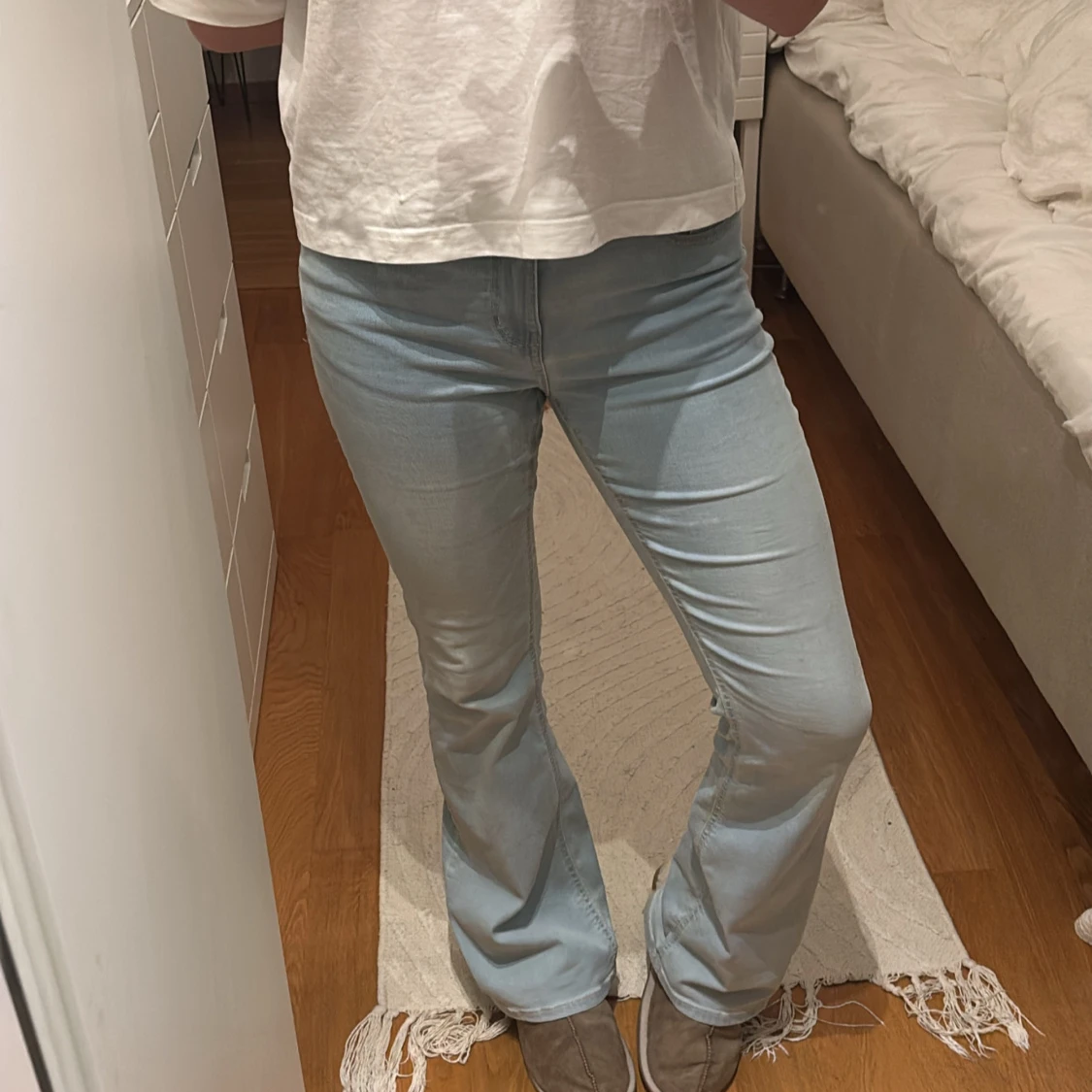 Ljusblå bootcut jeans