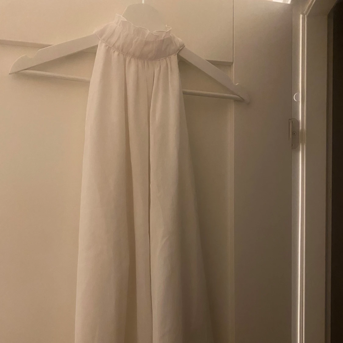 Vit ärmlös blus - 90