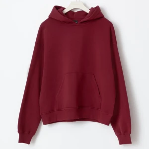 Vinröd hoodie  - Vinröd hoodie i storlek 158 från H&M. På bild 5 ser man trycket "nyc" tydligt. Har vanligtvis xs och denna sitter som en xs.