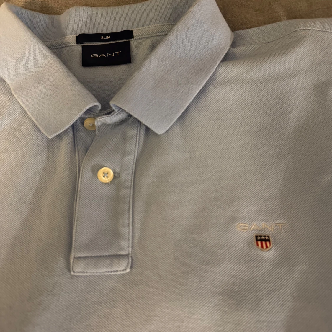 Ljusblå pikétröja från GANT - 90