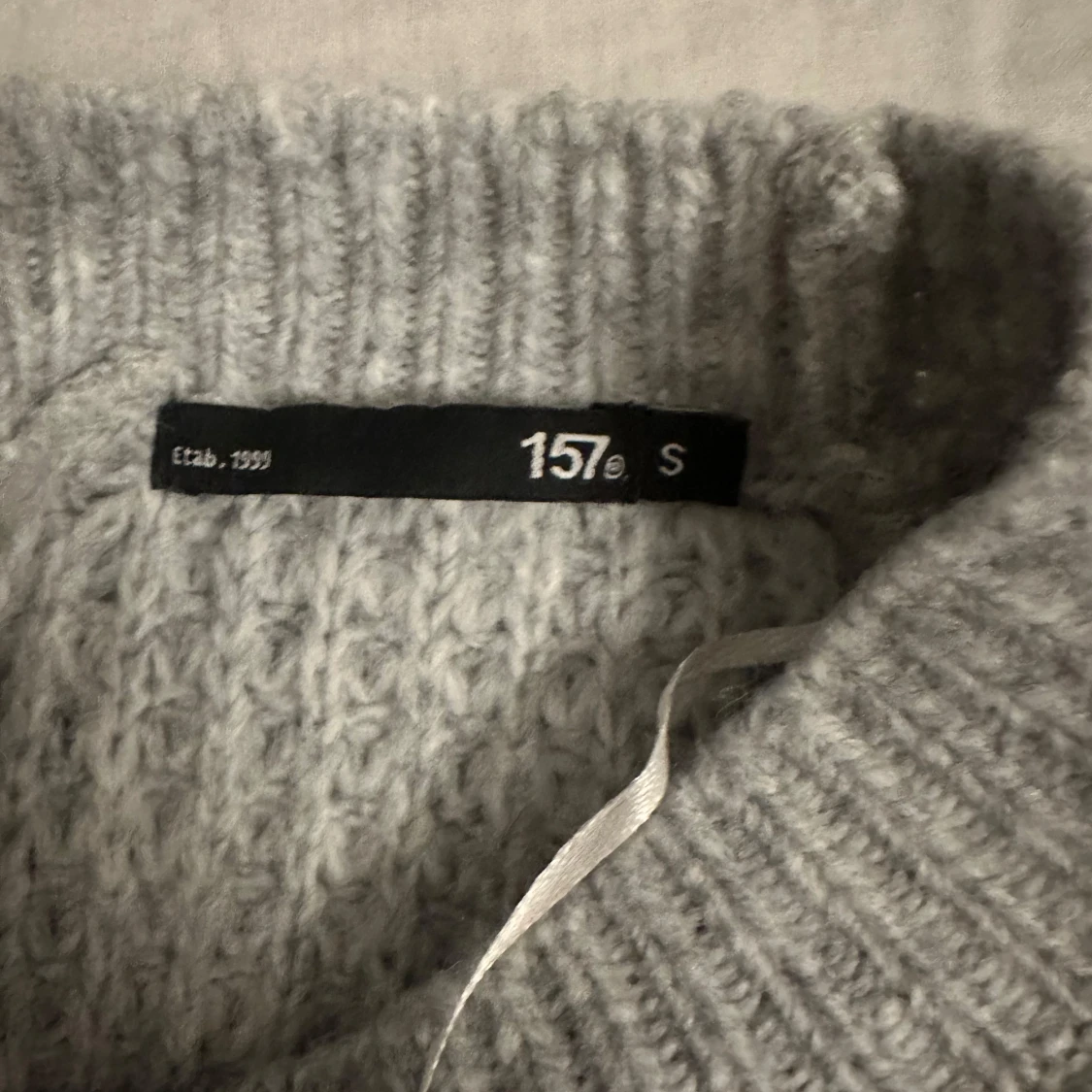 Grå stickad tröja från 157 - 91