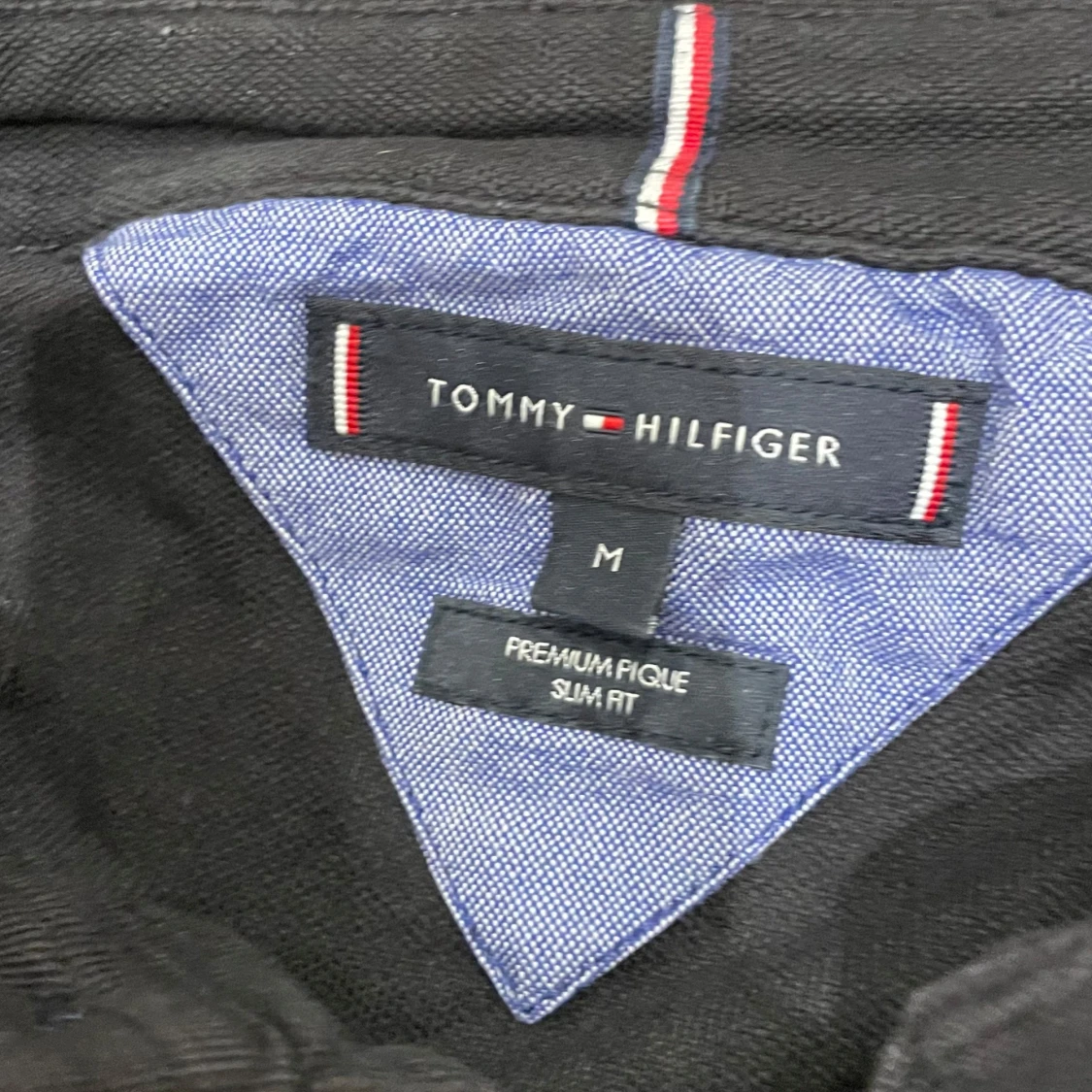 Svart pikétröja från Tommy Hilfiger - 91