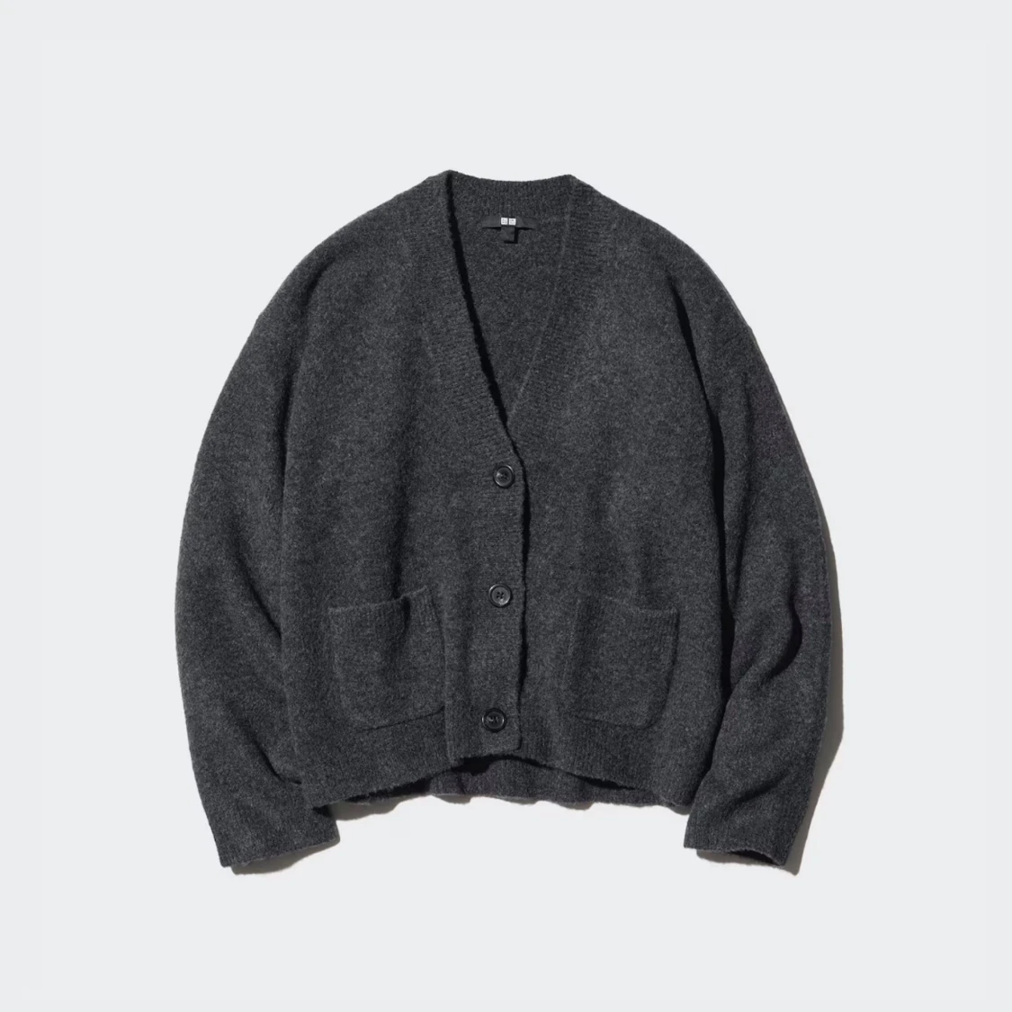 Svart kofta med fickor  - 1