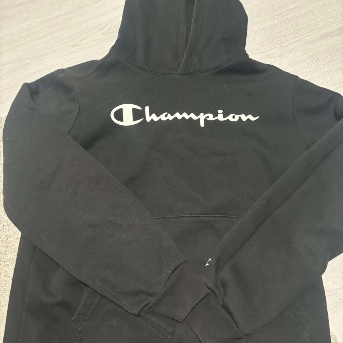 Svart hoodie från Champion - 1