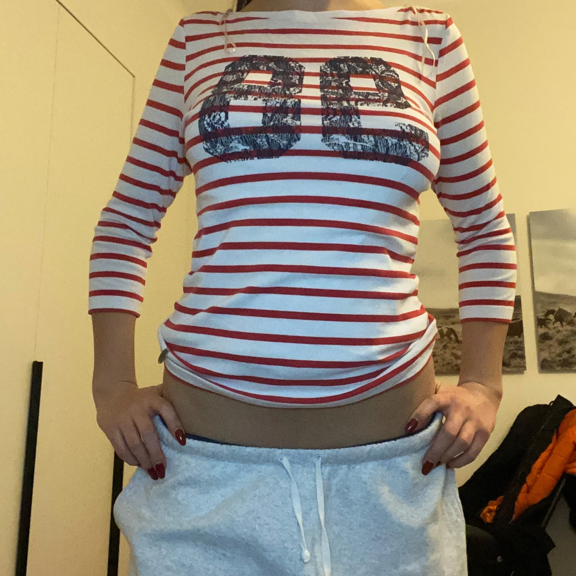 Randig långärmad topp med tryck - 93