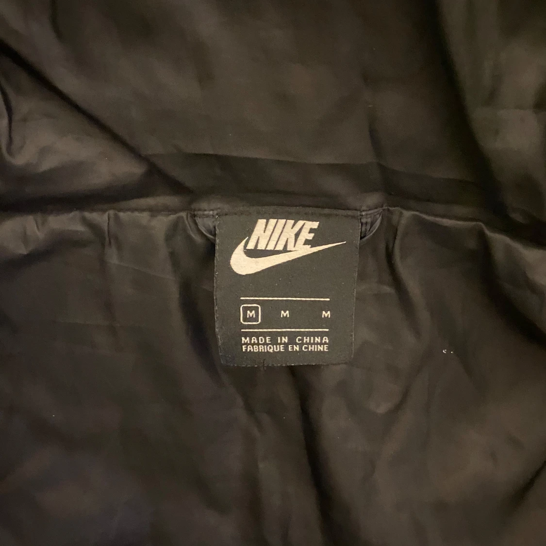 Svart dunjacka från Nike - 93