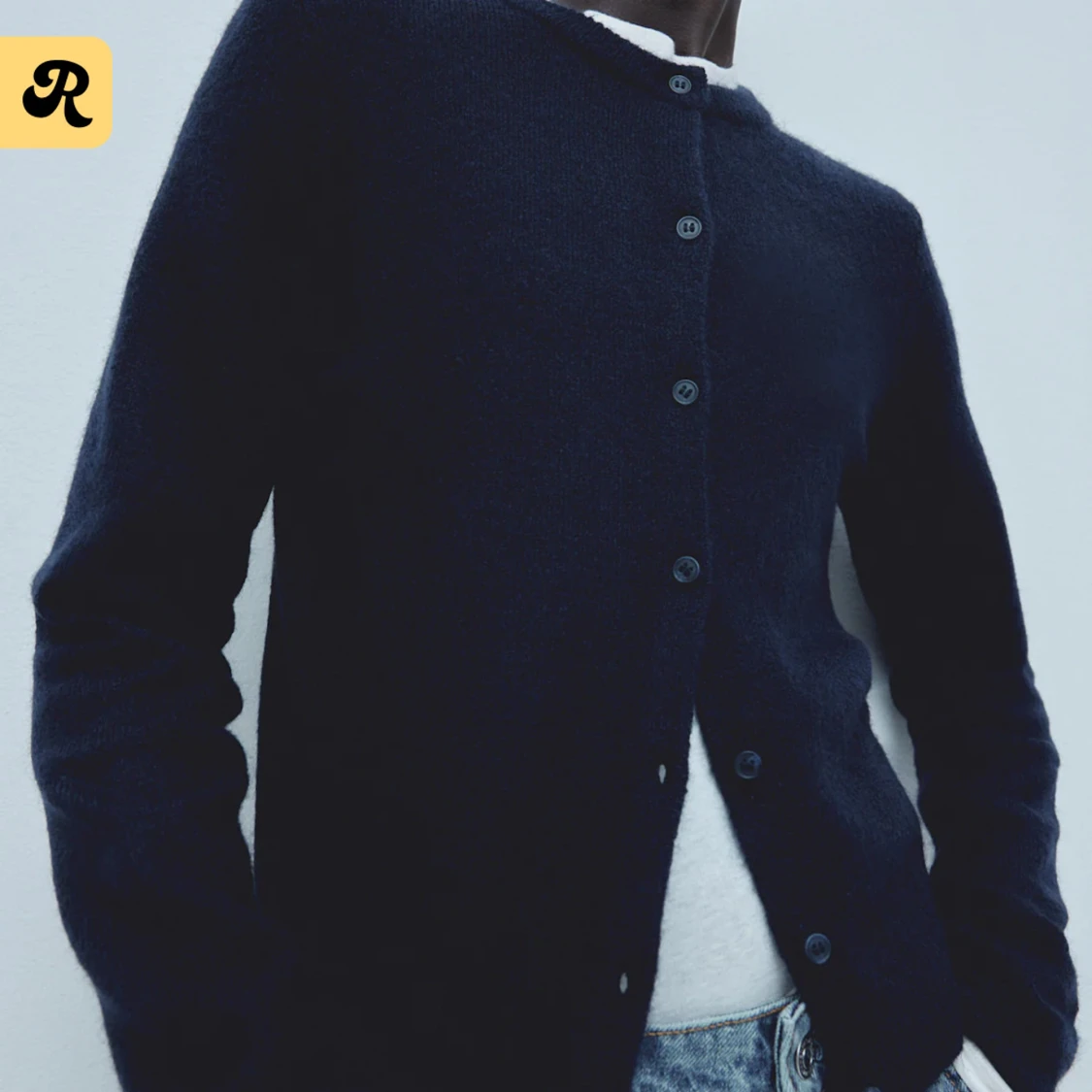 Mörkblå kofta med knappar