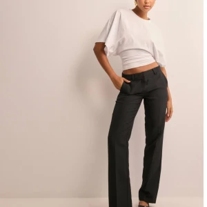 Lågmdijade kostymbyxor - Helt oanvända, lappen kvar strl 38 