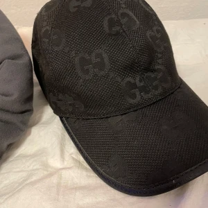 Gucci keps - Snygg svart keps från Gucci 