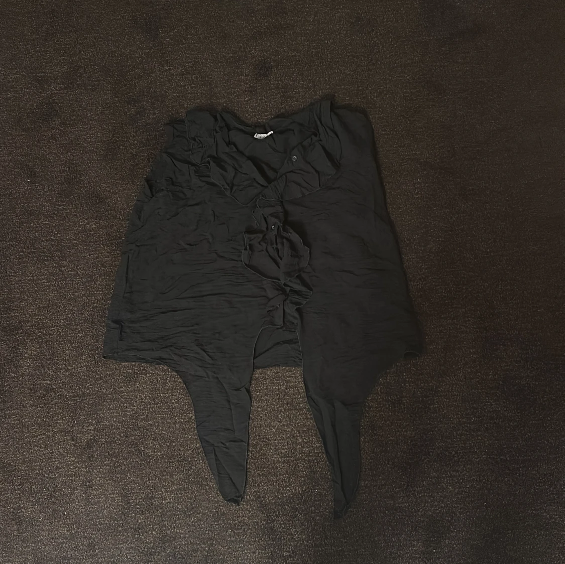 Svart asymmetrisk topp