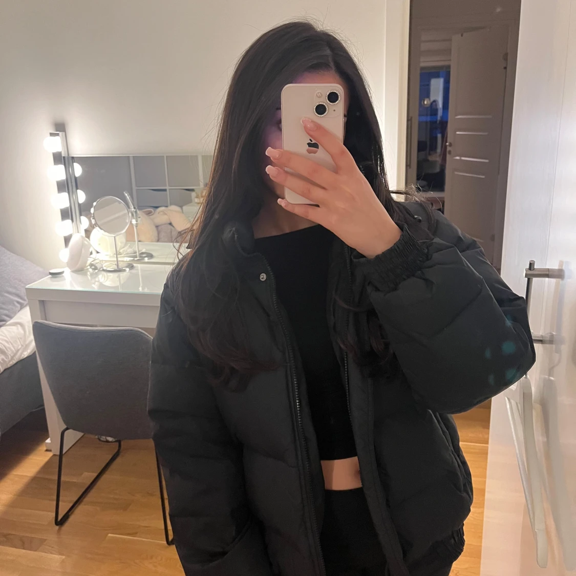 Svart pufferjacka från First Slope