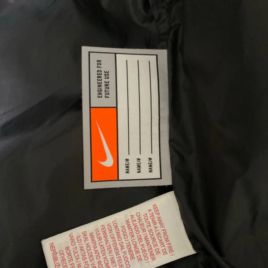 Svart dunjacka från Nike - 3