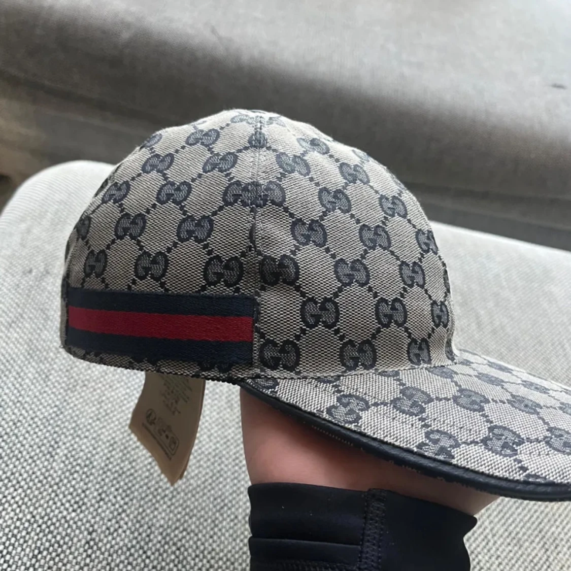 Beige keps från Gucci