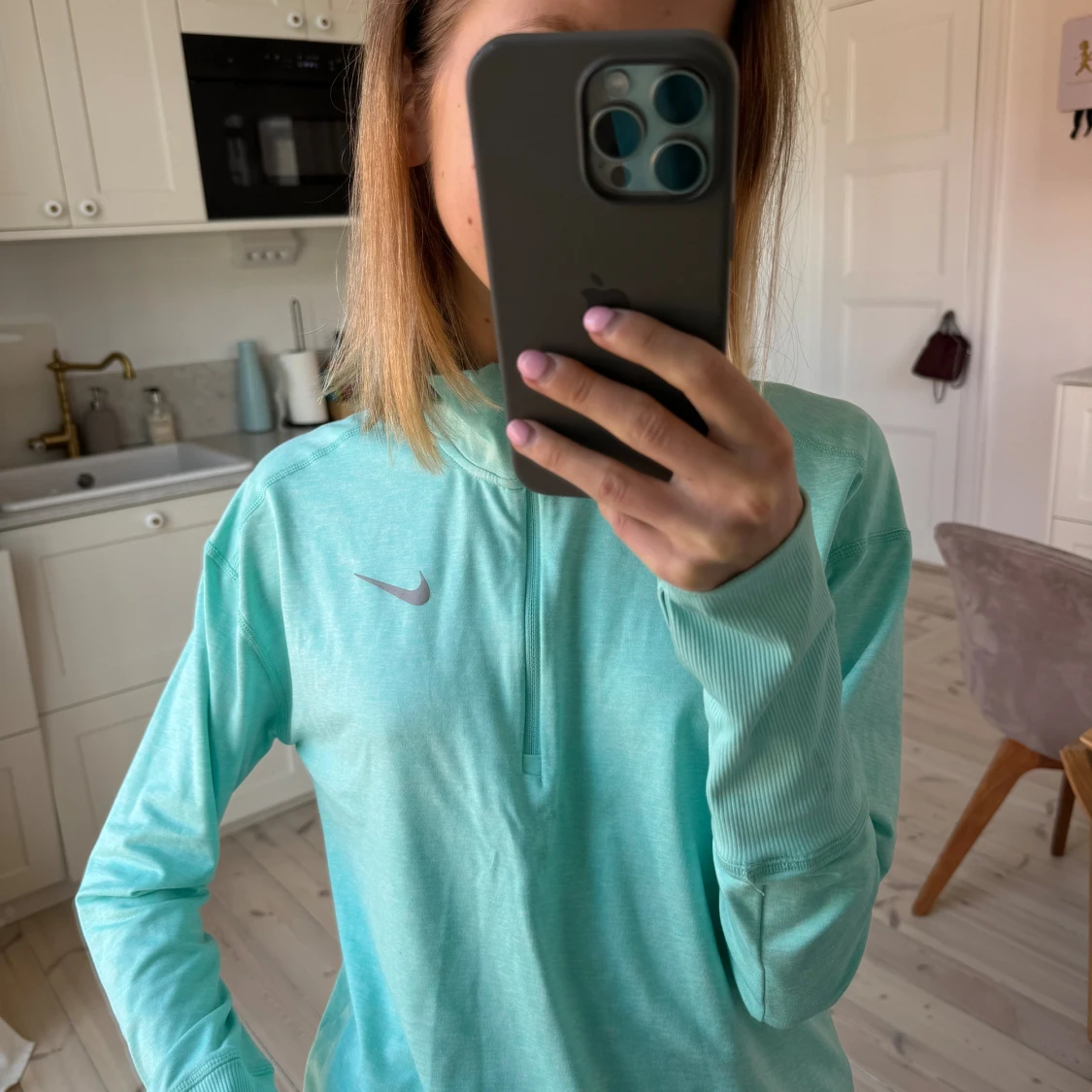 Turkos träningströja från Nike - 91