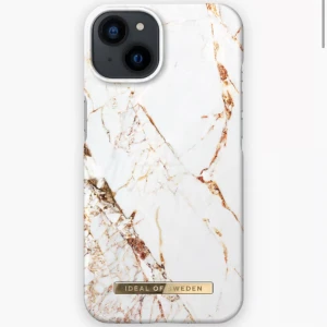 Marmormönstrat mobilskal från iDeal of Sweden - Säljer ett snyggt marmormönstrat mobilskal från iDeal of Sweden. Skalet har en vit bas med inslag av guld och brunt, vilket ger en lyxig känsla. Det är designat för iPhone 8/7/6/6S och kommer i originalförpackning. Perfekt för dig som vill skydda din mobil med stil! Använt några gånger och är lite slitet men utöver det är det hur fint som helst. Skriv gärna frågor om ni undrar något!❤️