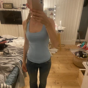 Blått linne - Ett ljus blått linne från jeans bolaget