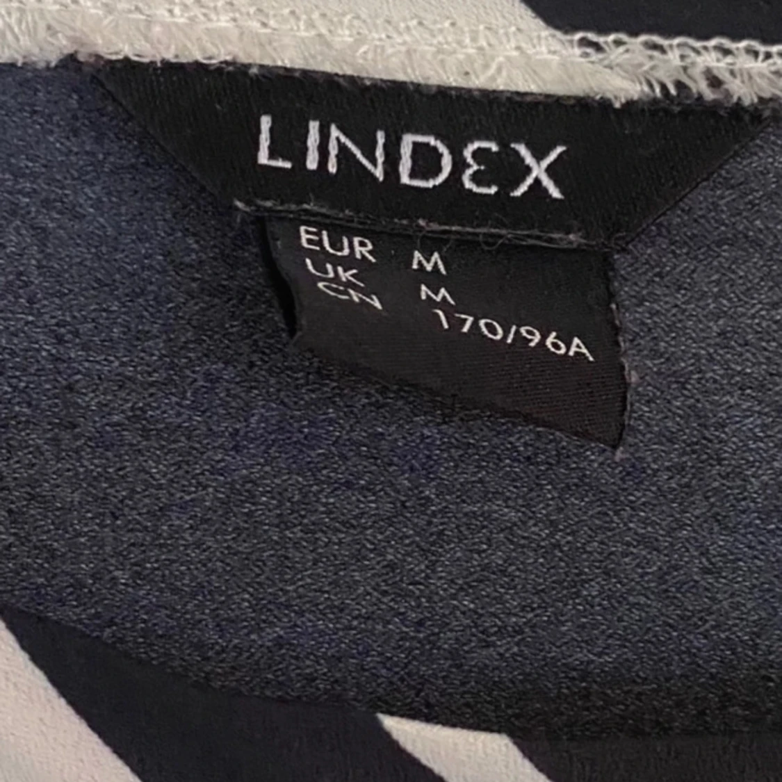 Randig polyester bok  - 90