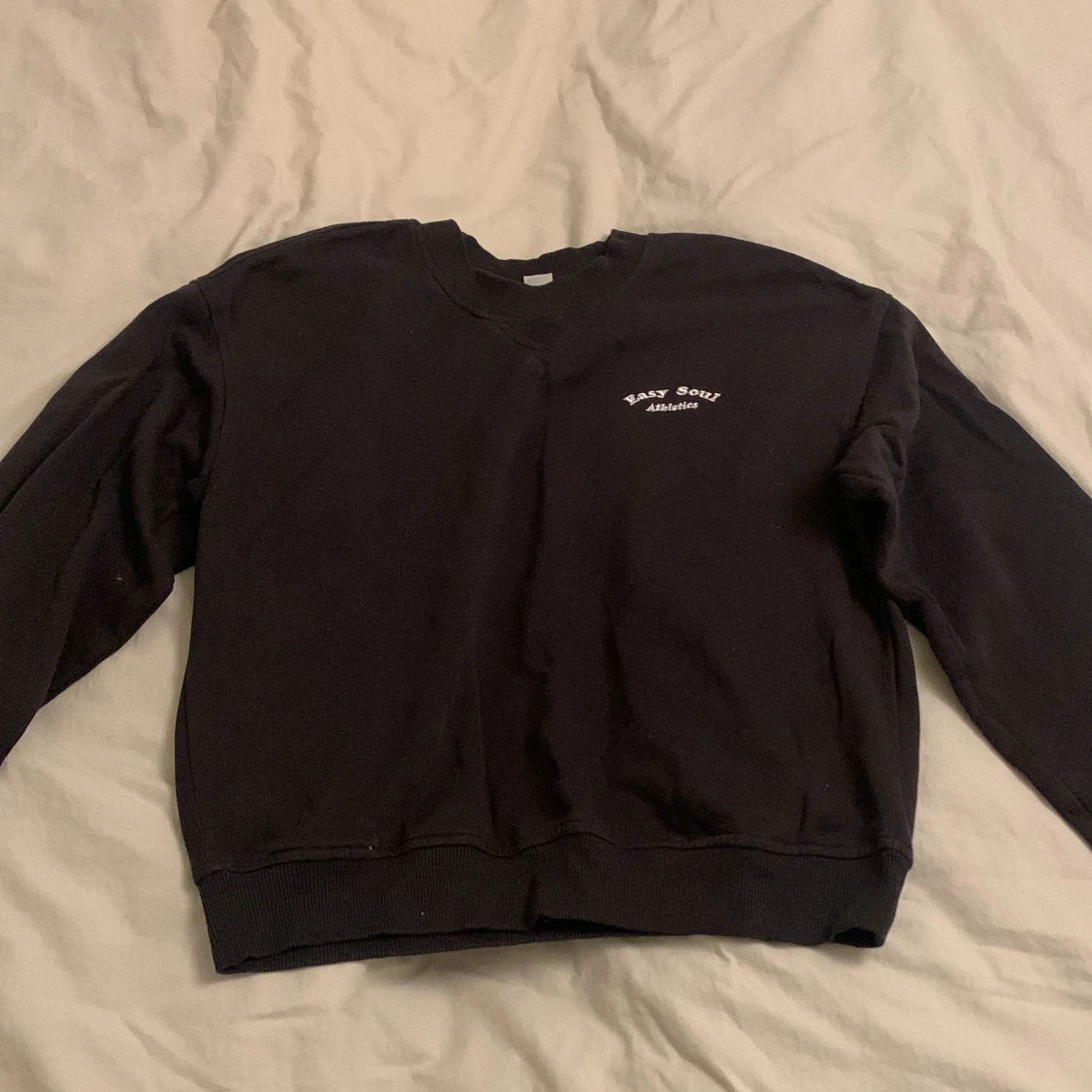 Svart sweatshirt från Easy Soul Athletics