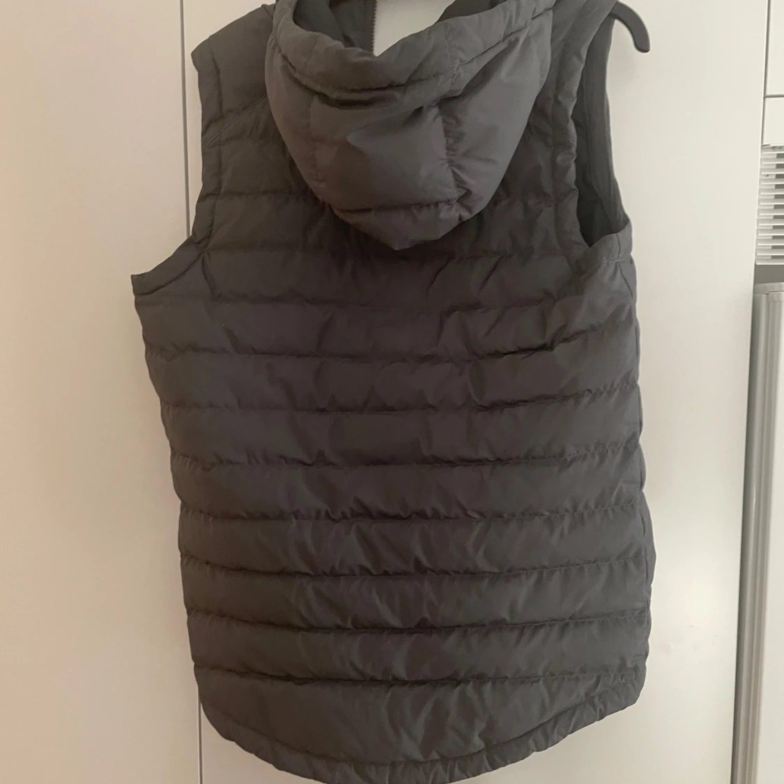 Grå dunväst från Nike - 90