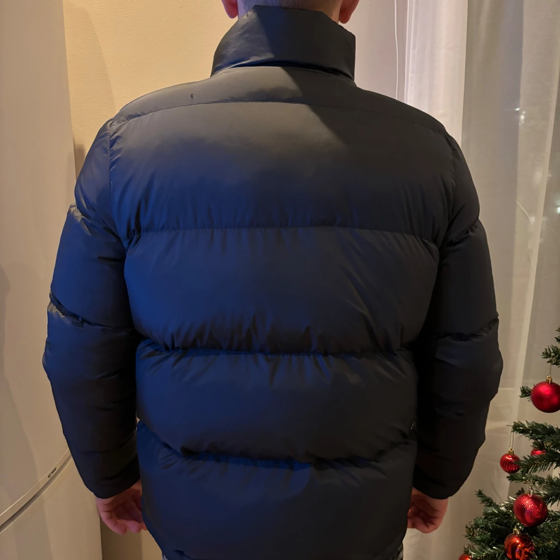 Svart dunjacka från Tommy Hilfiger - 91