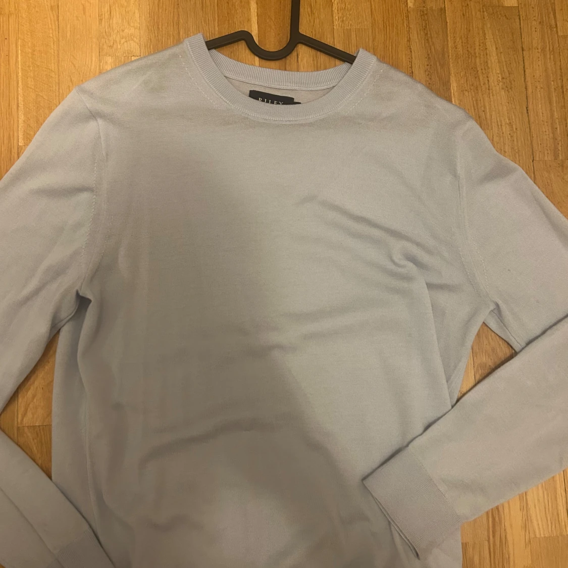 Ljusblå tröja från Riley