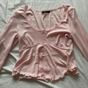 Rosa långärmad topp - Fin ljusrosa långärmad topp från Gina. Endast använd en gång💞