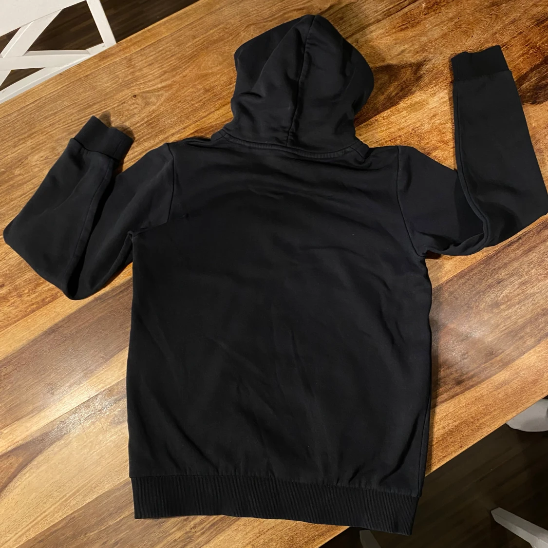 Svart hoodie från Peak Performance - 90