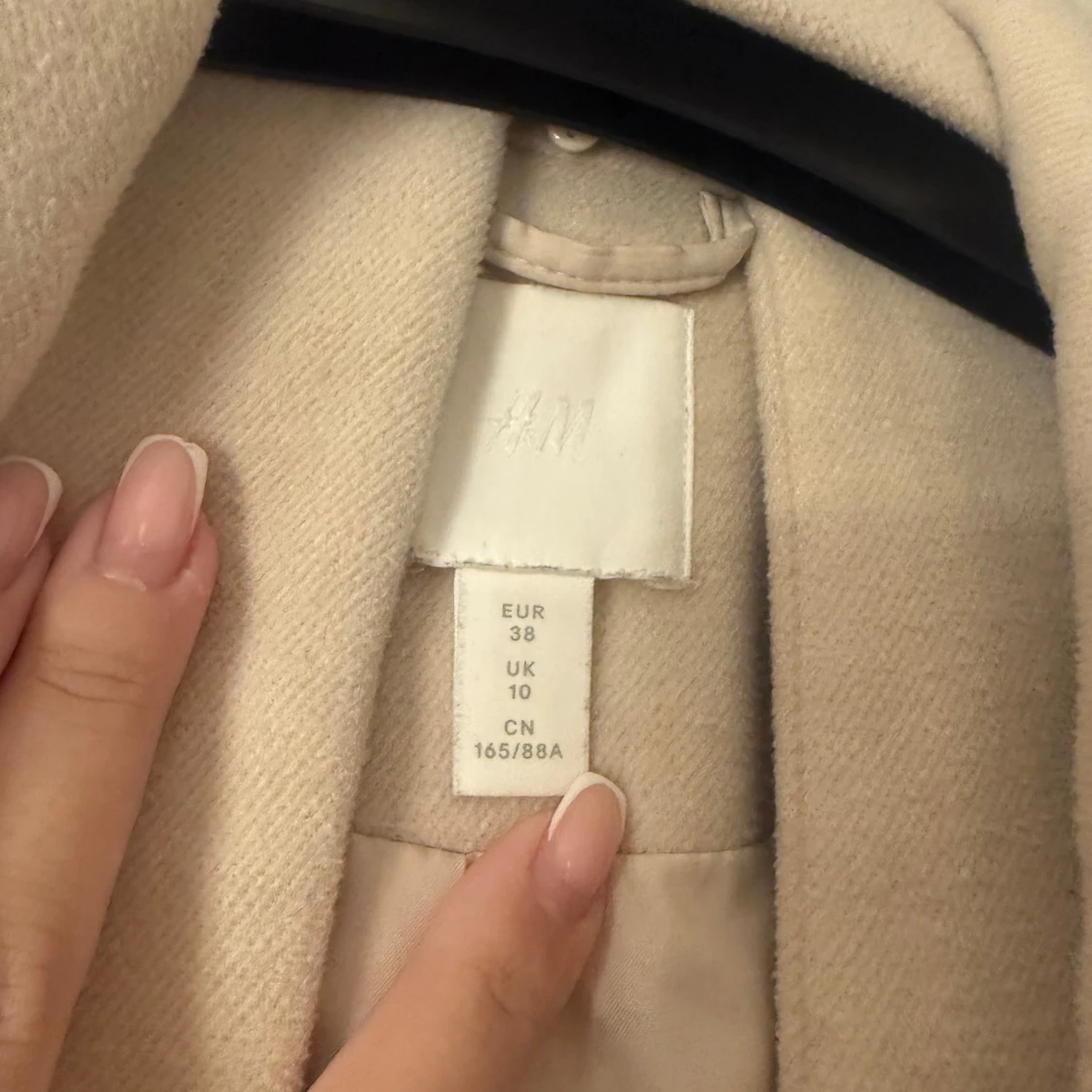 Beige kappa från H&M - 90