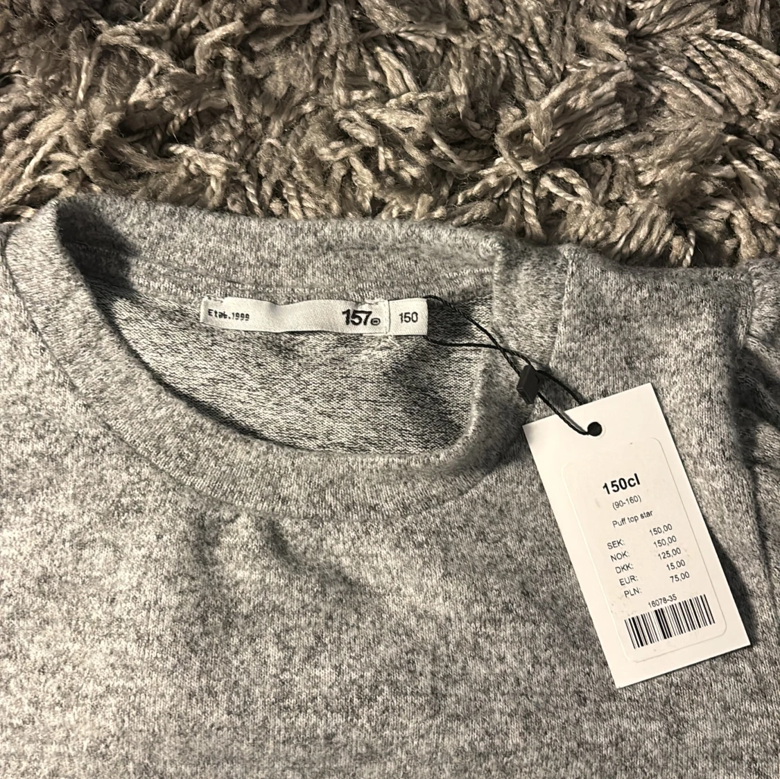 Grå tröja från 157 - 90