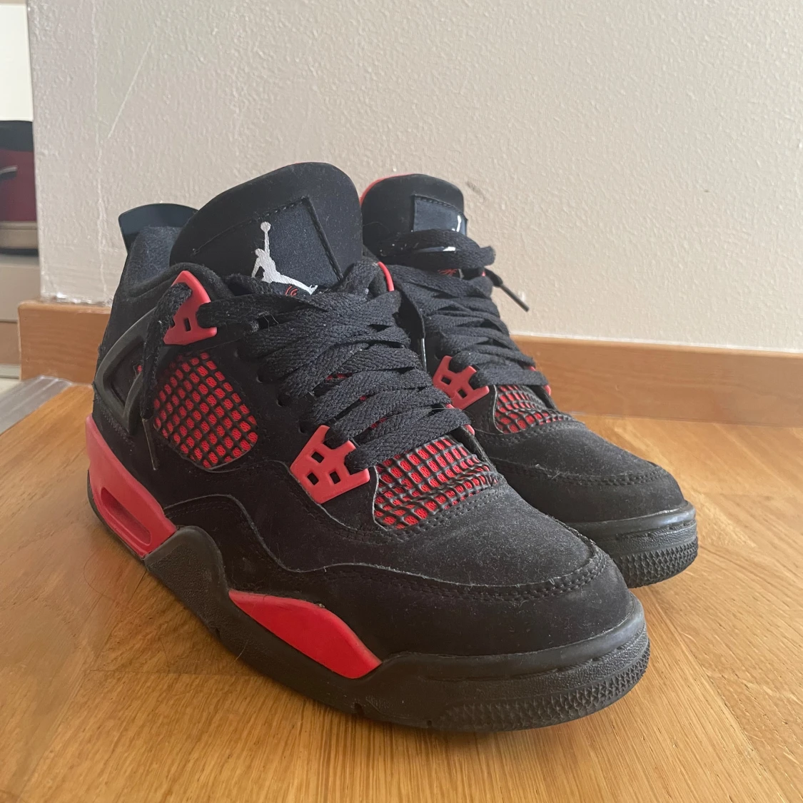 Jordan 4’s Red Thunder - 90