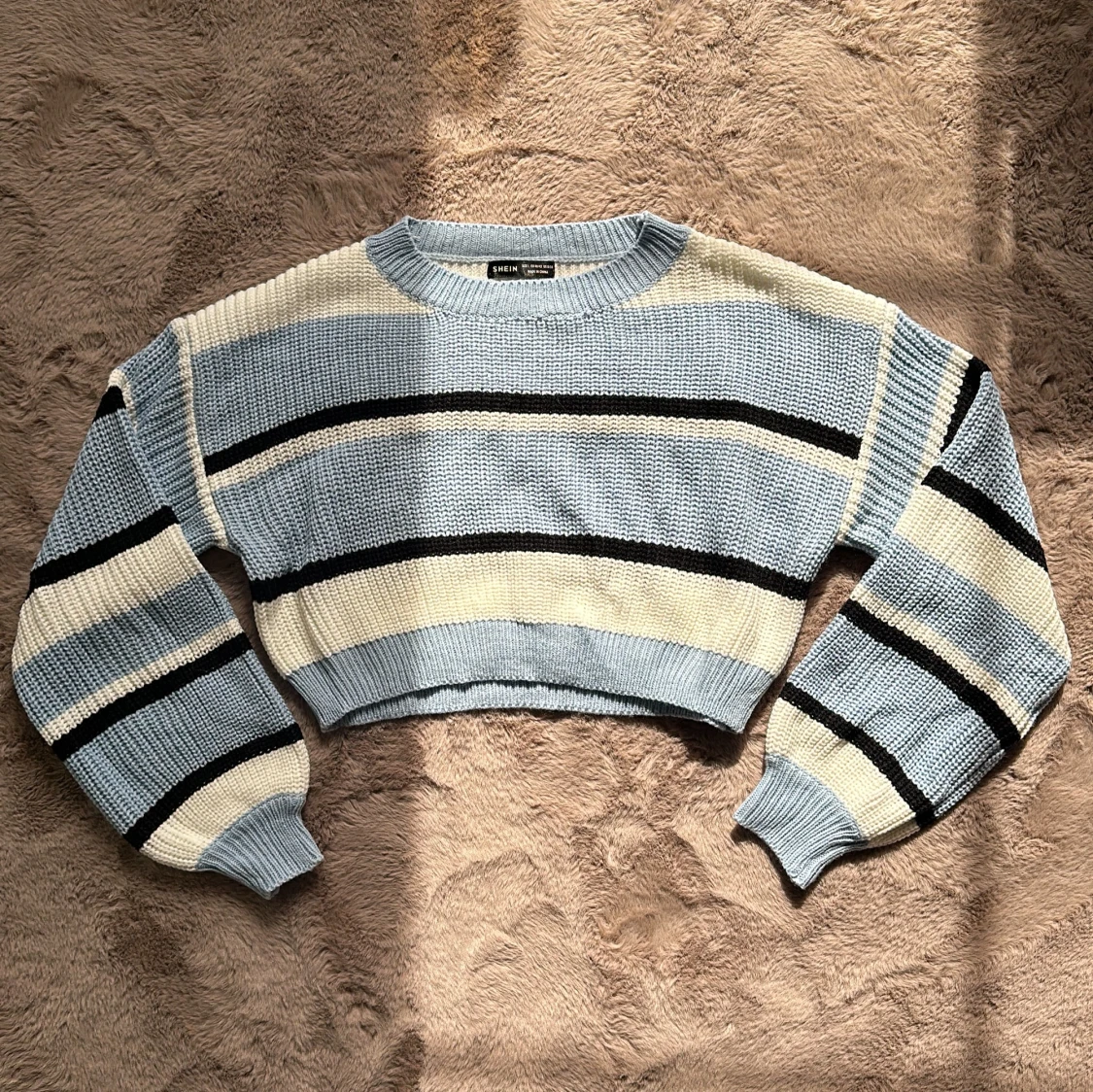 Stickad ”magtröja”