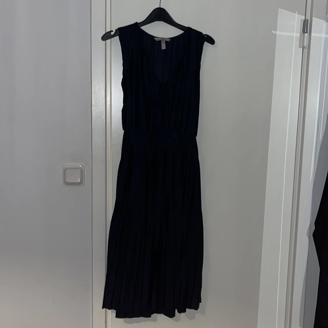 Blå skimrig klänning