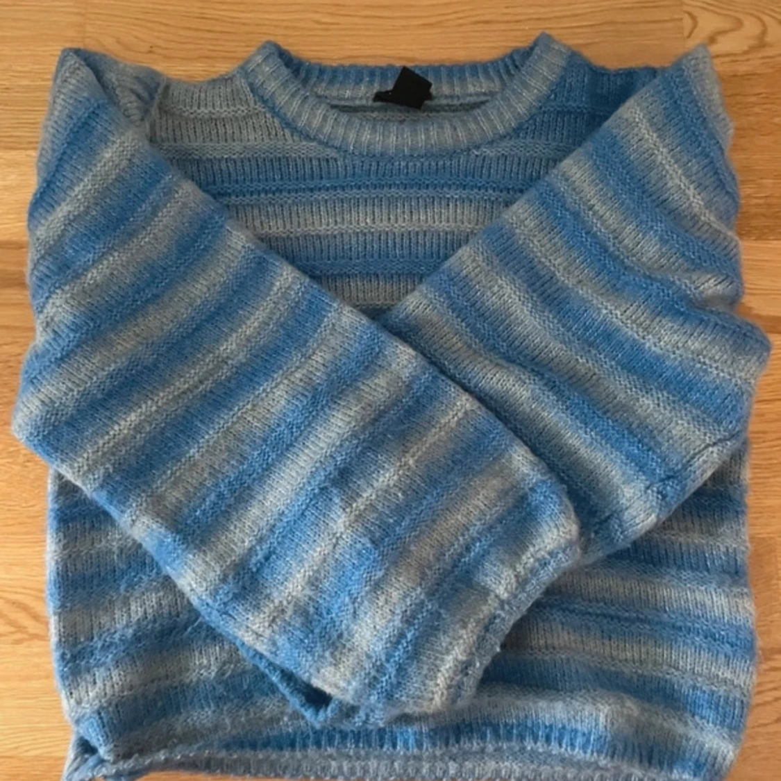 Blå stickad tröja - 91