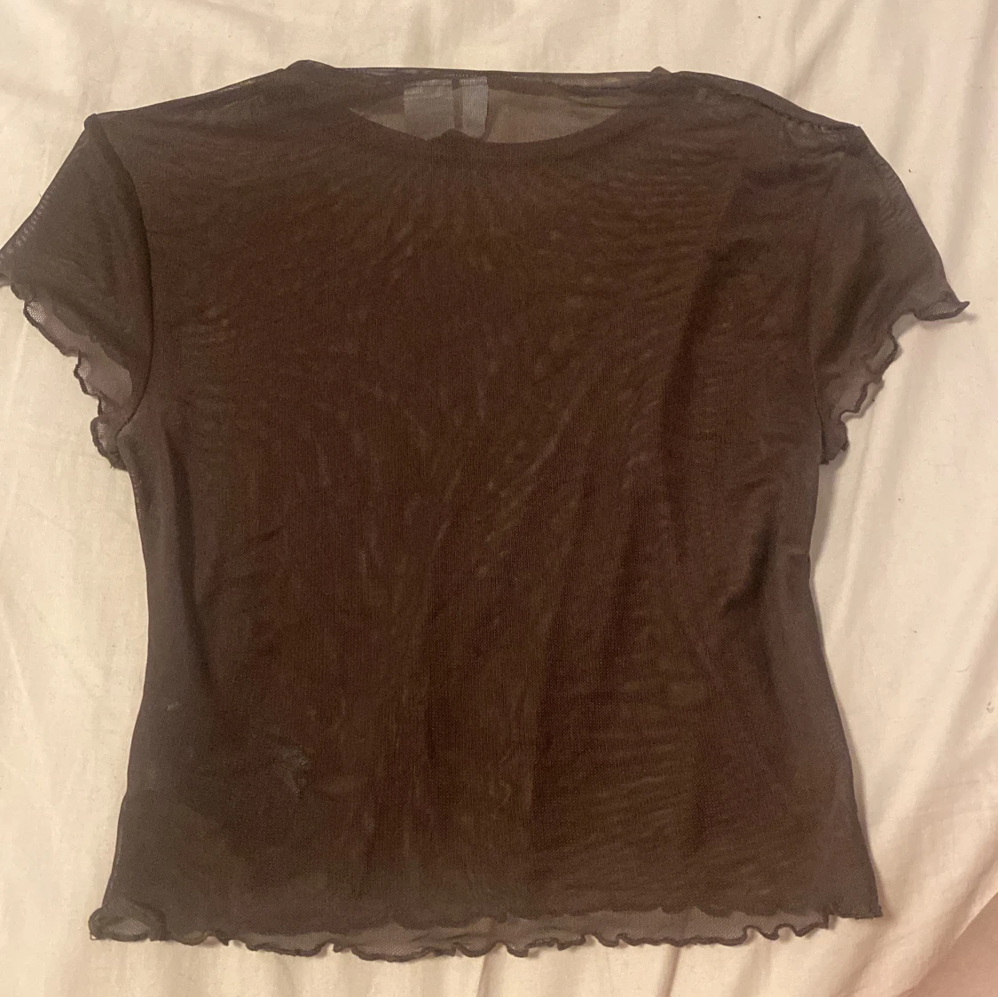 En brun genomskinlig t-shirt från H&M - 90