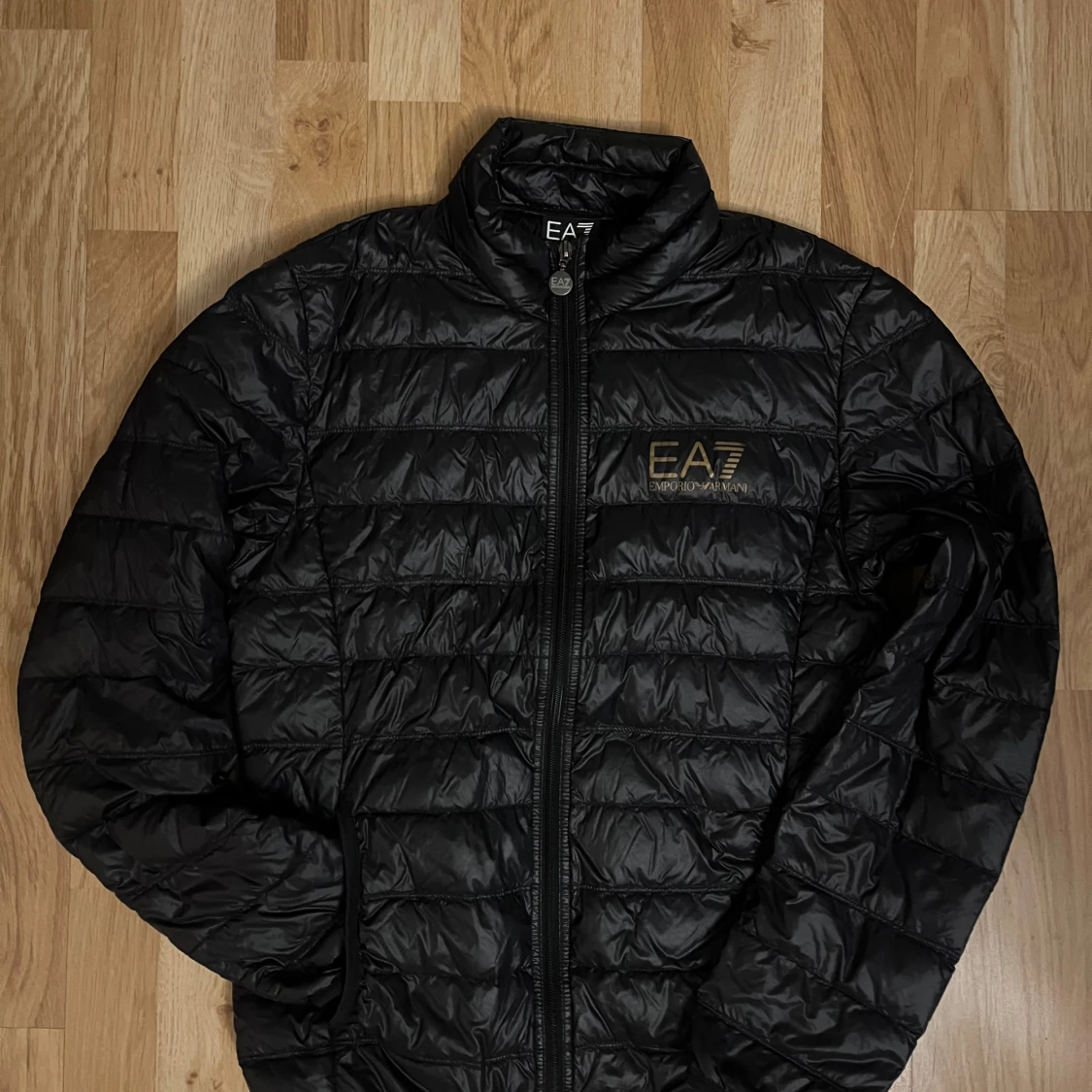 Svart quiltad jacka från Emporio Armani - 90