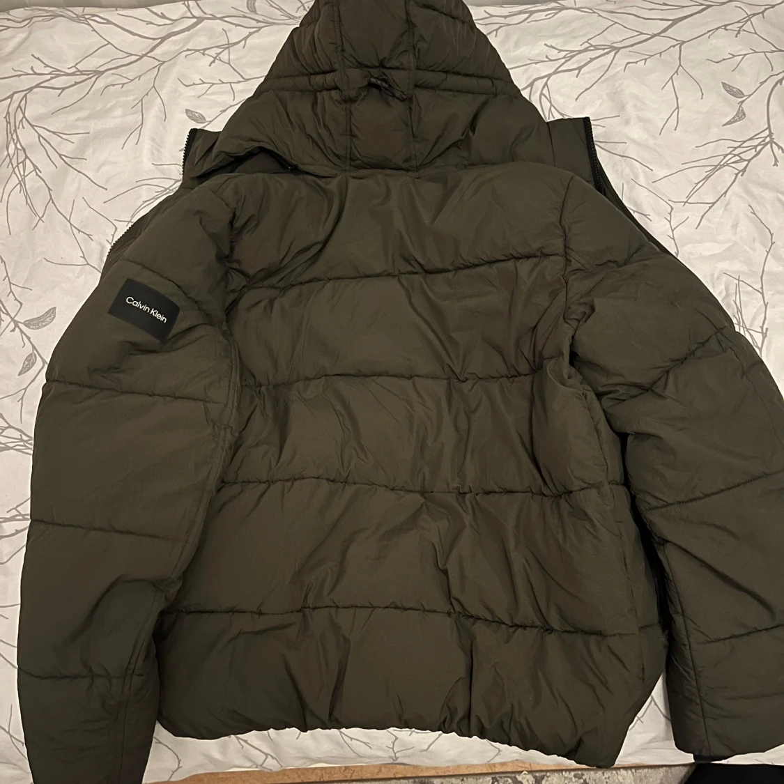 Grön pufferjacka från Calvin Klein - 91