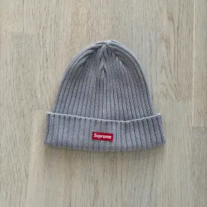 Grey Supreme beanie. Barely used. One size fits all