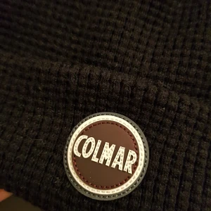 Colmar mössa  - Colm mössa 