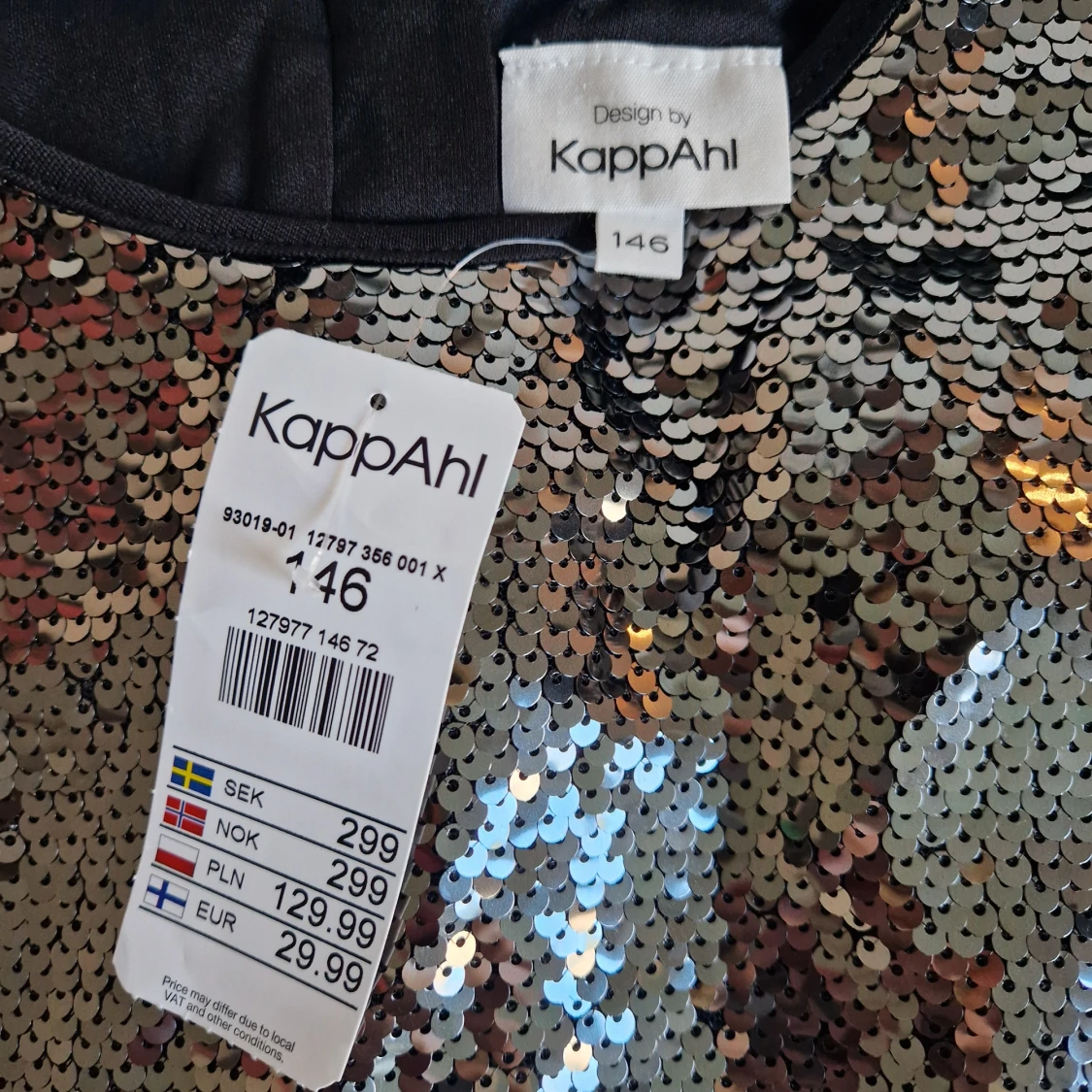 Glittrig paljettklänning  - 91