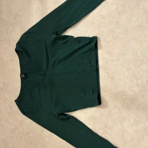 Skön tröja  - En grön fin tröja men kommer aldrig till användning 