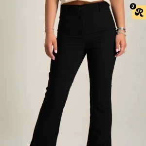 Intressekoll  - Oanvända, högmidjade kostymbyxor stl 158