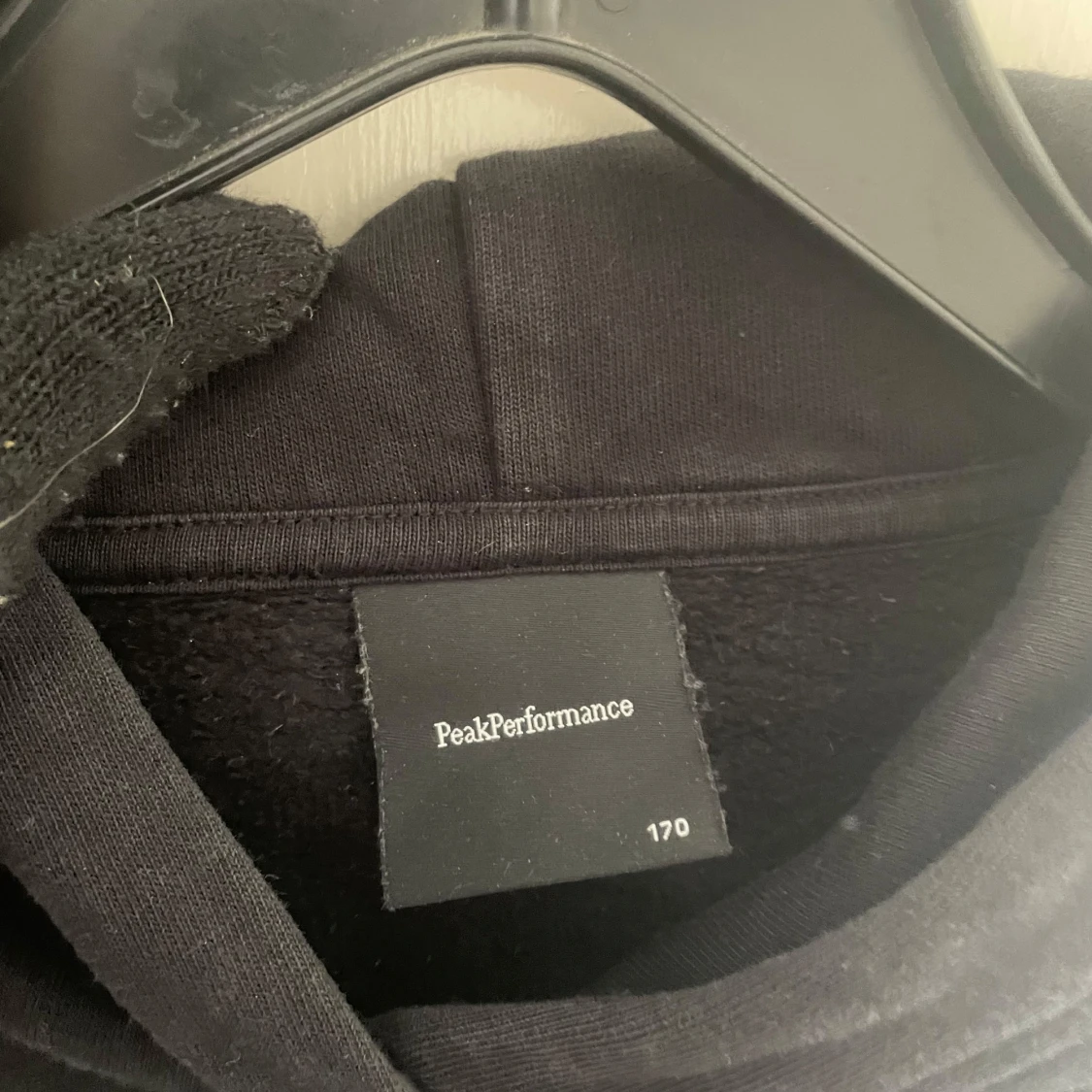 Svart hoodie från Peak Performance - 91