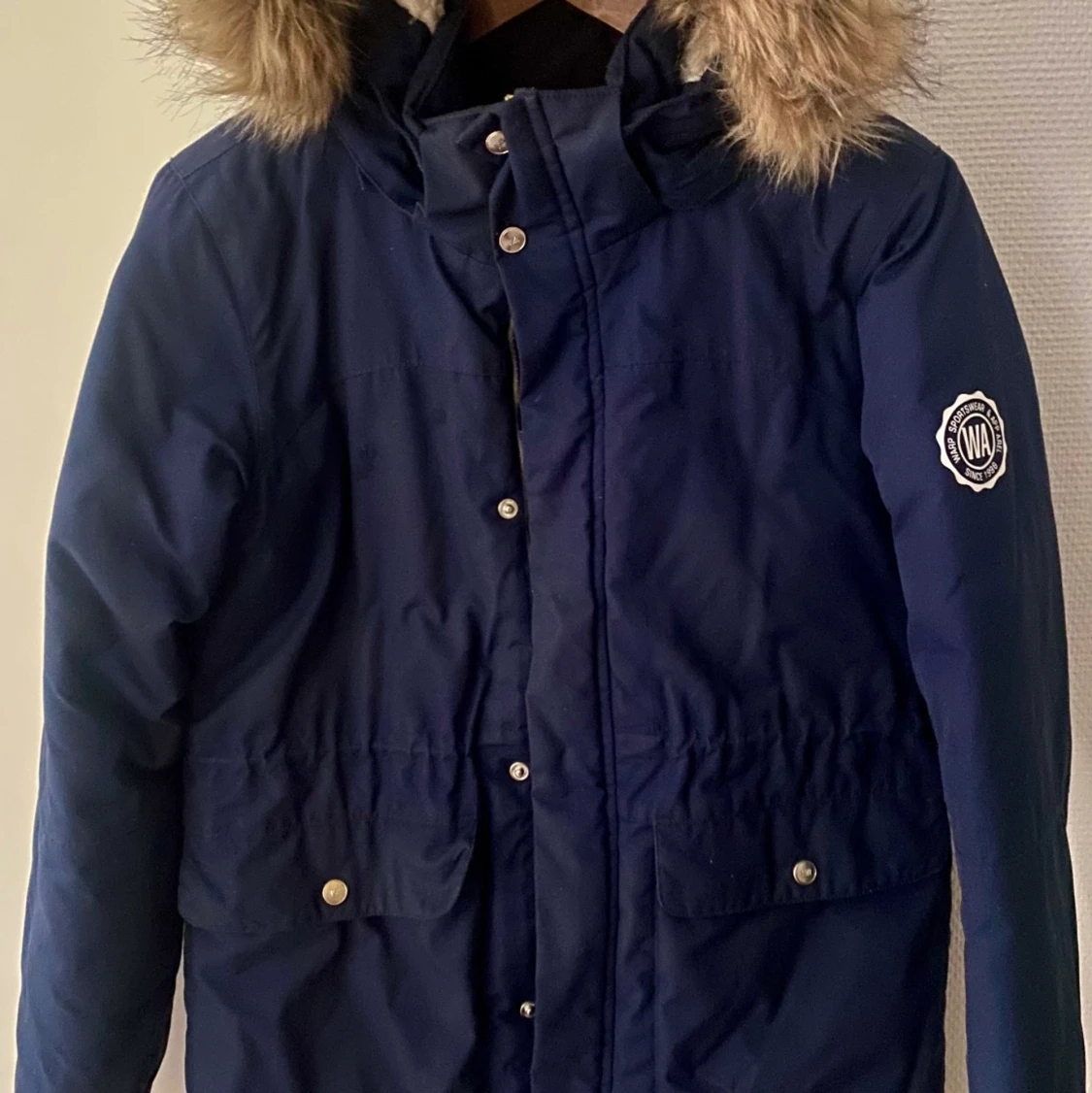 Mörkblå vinter jacka i storlek 164