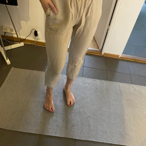 Byxor - Beiga lösa linnebyxor, använda fåtal gånger