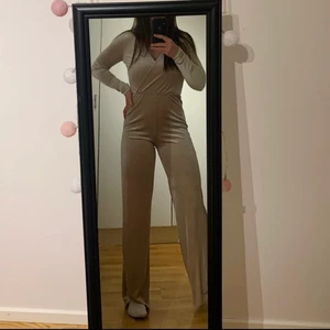 Oanvänd byxdress - Helt oanvänd byxdress med lappen kvar.