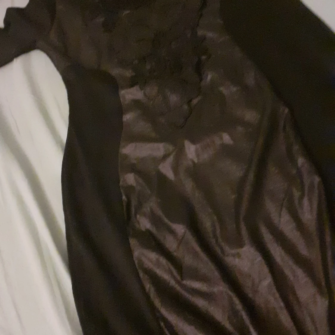 M. Svart knähöjdsklänning.  - 90