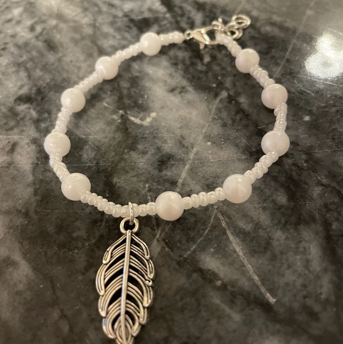 Armband - fjäder - 90